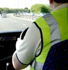 Picture of a man driving a minivan.